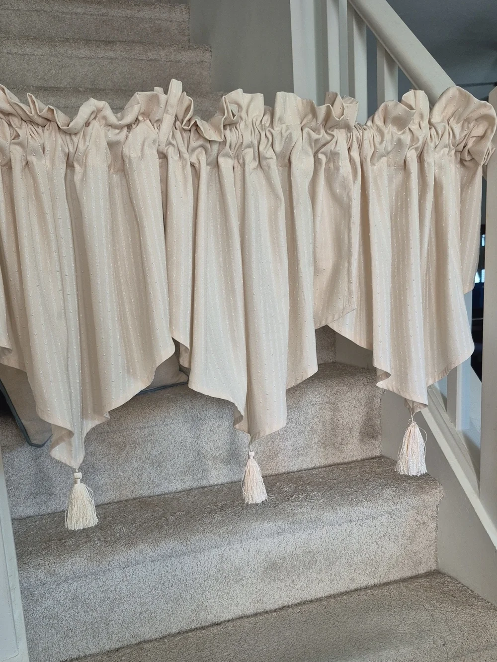 Three Cream Tasseled Curtain Panels